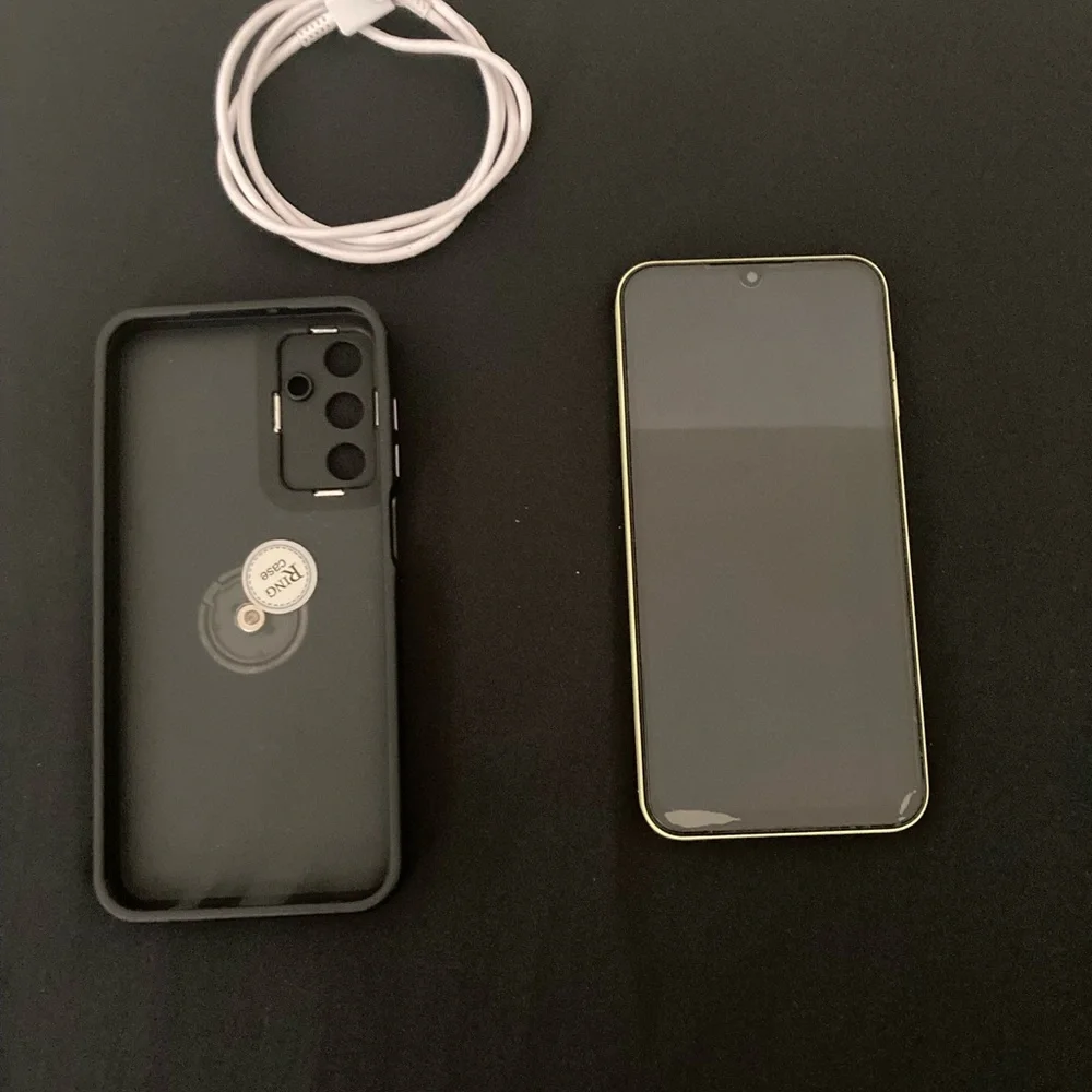 Samsung Yellow Smartphone with Black Case and White Cable